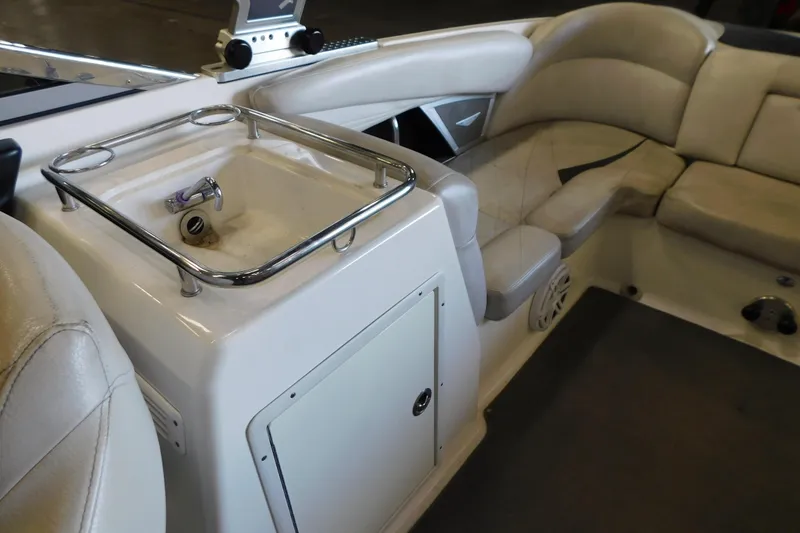 Slide: The Image of 2009 MasterCraft X55 boat interior with seating and built-in sink. - 32