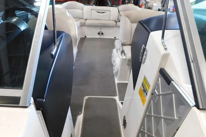 Slide: The Image of 2009 MasterCraft X55 boat interior with seating and dashboard view. - 41