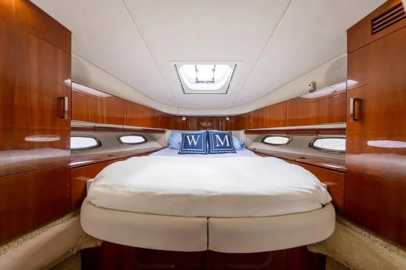 Slide: The Image of Luxurious cabin interior of 2009 Sea Ray 43 Sundancer yacht with elegant wood finish. - 26