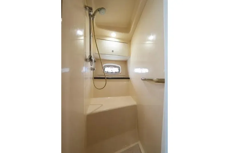 Slide: The Image of Shower area in 2009 Sea Ray 43 Sundancer yacht, featuring sleek design and modern fixtures. - 31