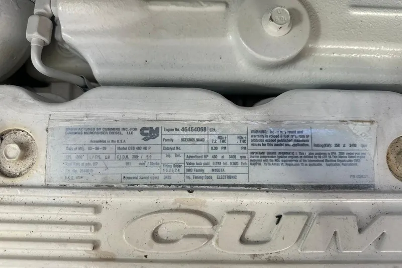 Slide: The Image of Close-up of Cummins engine label on a 2009 Sea Ray 43 Sundancer boat. - 35