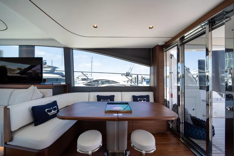 Slide: The Image of Luxurious interior of 2025 Princess F65 yacht with elegant seating and modern design. - 11