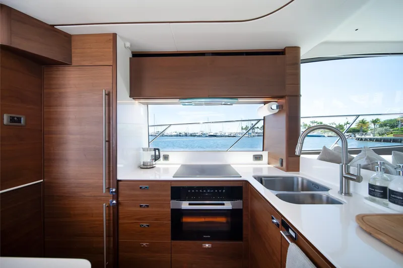 Slide: The Image of Luxurious kitchen interior of 2025 Princess F65 yacht with modern appliances and ocean view. - 13