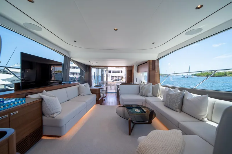 Slide: The Image of Luxurious interior of 2025 Princess F65 yacht with panoramic windows and elegant seating. - 17