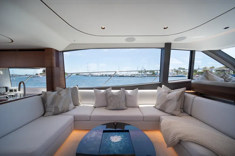 Slide: The Image of Luxurious interior of 2025 Princess F65 yacht with waterfront view and elegant seating. - 18