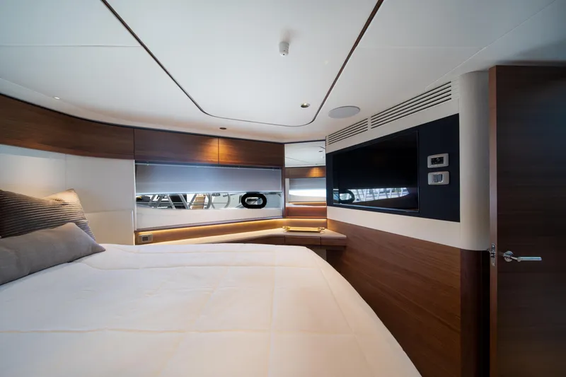 Slide: The Image of Luxurious bedroom interior of 2025 Princess F65 yacht with modern design and amenities. - 29