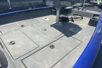 Slide: The Image of 2014 Tracker Pro Team 175 TF boat deck with storage compartments. - 2