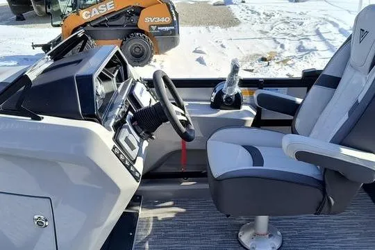 Slide: The Image of Interior of a 2026 Viaggio x22u boat with steering console and seat. - 6