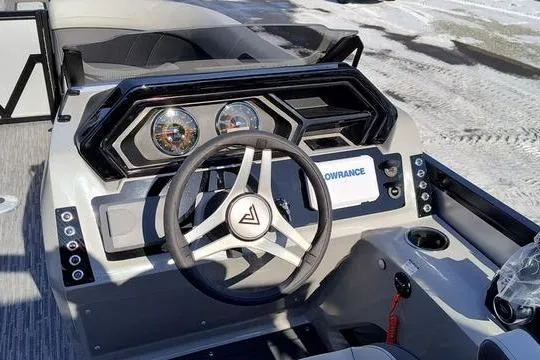 Slide: The Image of Viaggio x22u 2026 boat dashboard with modern steering wheel and controls. - 8