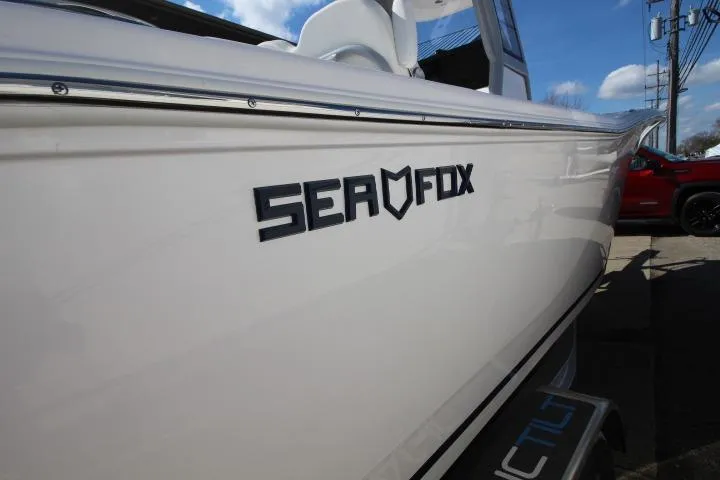 Slide: The Image of Sea Fox 248 Commander 2026 boat, side view with logo. - 15