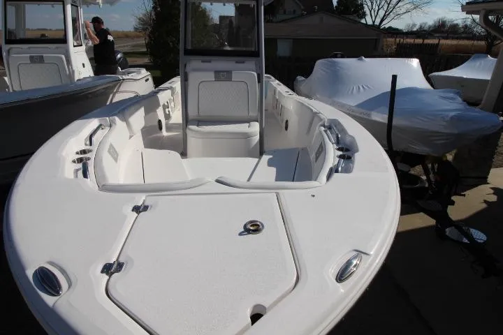 Slide: The Image of 2026 Sea Fox 248 Commander boat, front view outdoors. - 2