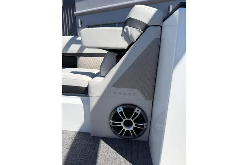 Slide: The Image of 2026 Crest Caribbean 250 SLS boat seat with integrated speaker and stylish upholstery. - 34