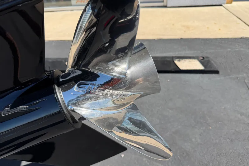 Slide: The Image of Close-up of a Mercury Enertia Eco propeller on a 2026 Crest Caribbean 250 SLS boat. - 7