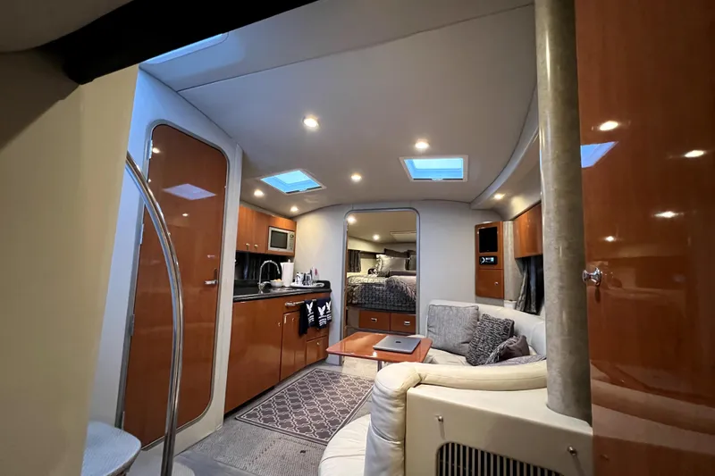 Slide: The Image of Interior of a 2006 Formula 37 Performance Cruiser with modern amenities and cozy seating. - 14