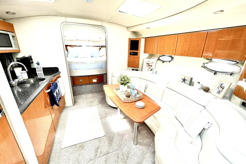 Slide: The Image of Luxurious interior of a 2006 Formula 37 Performance Cruiser with modern amenities and elegant design. - 16