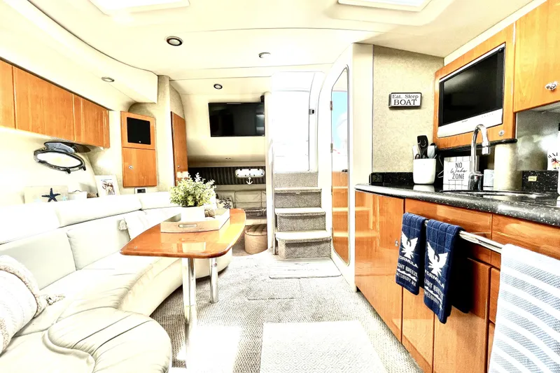 Slide: The Image of Luxurious interior of a 2006 Formula 37 Performance Cruiser with modern amenities. - 18