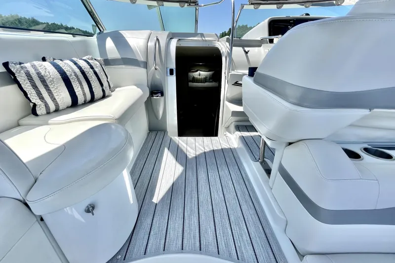 Slide: The Image of 2006 Formula 37 Performance Cruiser interior with white seating and striped flooring. - 7