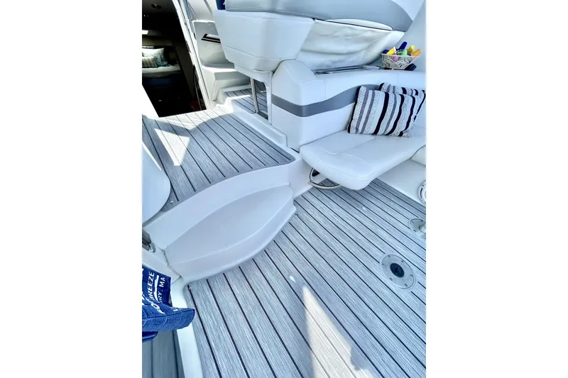 Slide: The Image of 2006 Formula 37 Performance Cruiser interior with striped flooring and cushioned seating. - 8