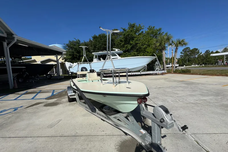 Slide: The Image of 2015 Hells Bay Professional boat on trailer in sunny outdoor setting. - 6
