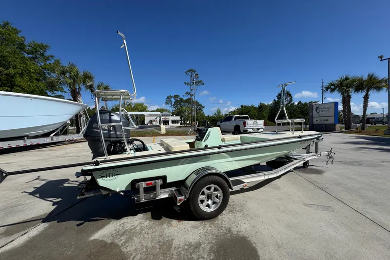 Slide: The Image of 2015 Hells Bay Professional boat on trailer in sunny outdoor setting. - 9