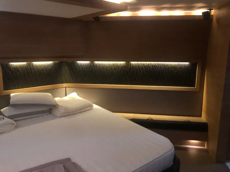 Slide: The Image of Luxurious bedroom interior of 2012 Monte Carlo Yachts 76 with modern lighting. - 26