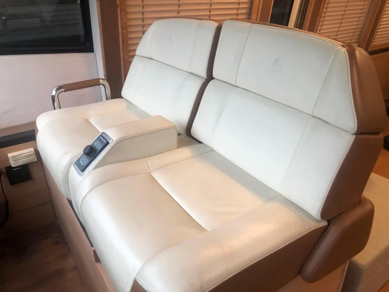 Slide: The Image of Luxurious leather seating in 2012 Monte Carlo Yachts 76 model. - 35