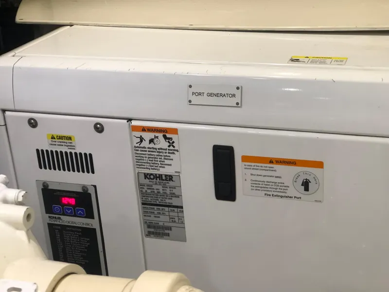 Slide: The Image of Port generator of a 2012 Monte Carlo Yachts 76 model. - 37