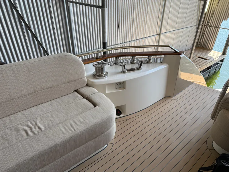 Slide: The Image of Luxurious seating area on a 2012 Monte Carlo Yachts 76, featuring elegant design and craftsmanship. - 42