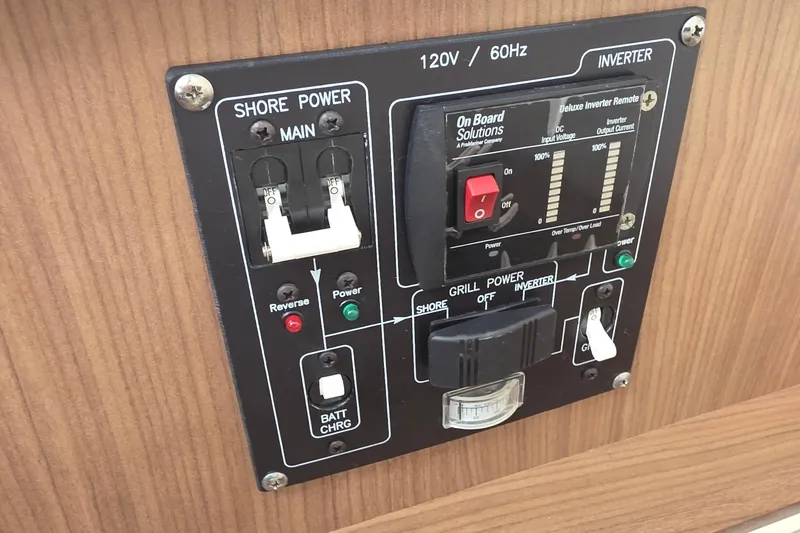 Slide: The Image of Electrical control panel on a 2015 Boston Whaler 270 Vantage boat. - 29