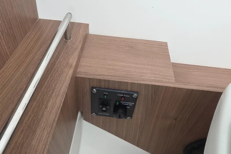 Slide: The Image of Control panel on 2015 Boston Whaler 270 Vantage boat with wooden finish. - 30