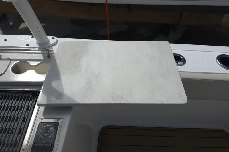 Slide: The Image of Boston Whaler 270 Vantage 2015 boat with Kenyon grill and countertop setup. - 45