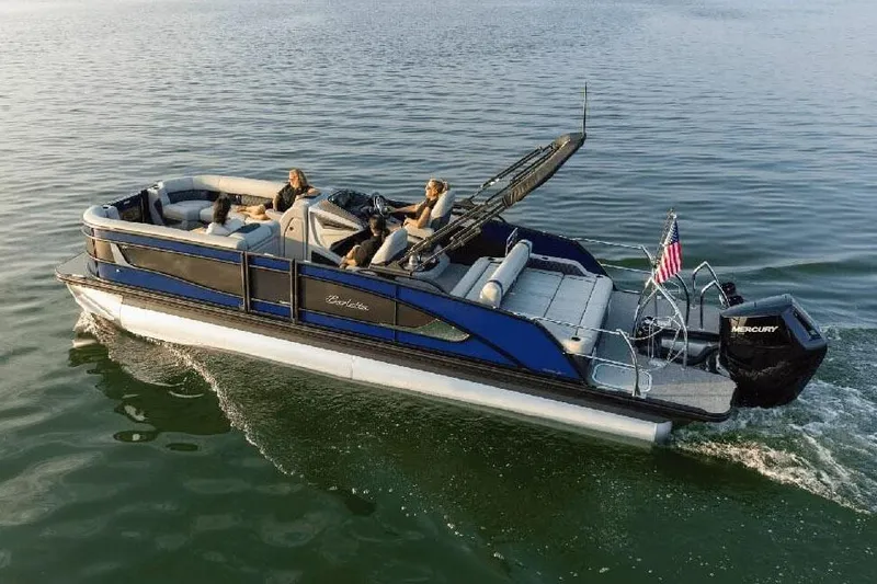 Slide: The Image of Manufacturer Provided Image: 2026 Barletta Lusso 25UC pontoon boat cruising on a calm lake. - 7