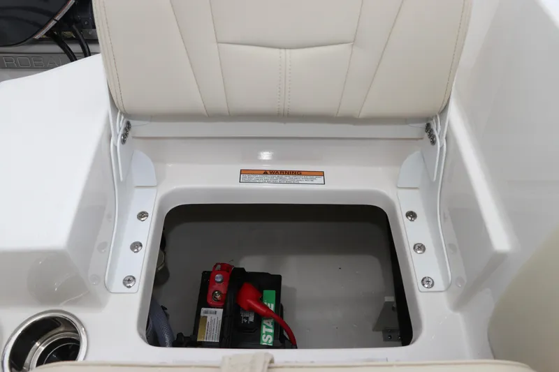 Slide: The Image of 2026 Robalo R200 Center Console boat seat storage with battery compartment. - 13