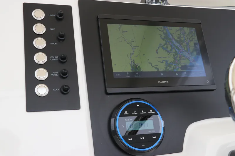 Slide: The Image of 2026 Robalo R200 Center Console dashboard with Garmin navigation and control panel. - 17