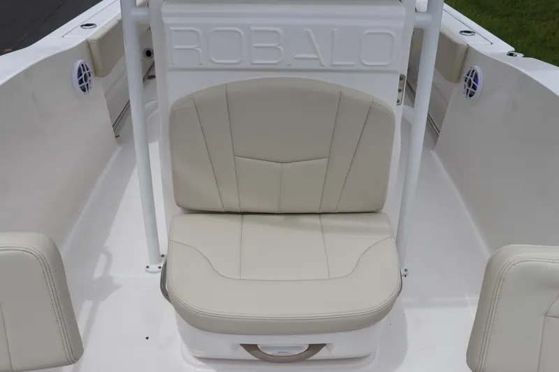 Slide: The Image of 2026 Robalo R200 Center Console boat seat with beige upholstery and Robalo branding. - 22