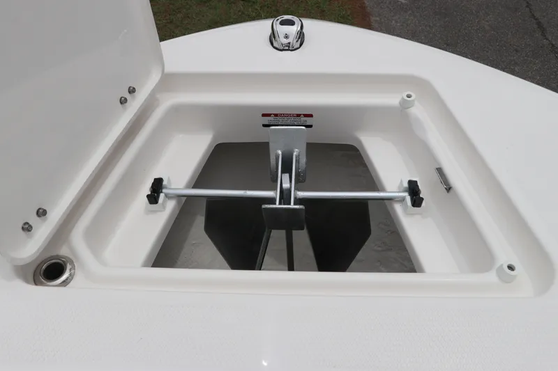 Slide: The Image of Anchor storage compartment on 2026 Robalo R200 Center Console boat. - 28