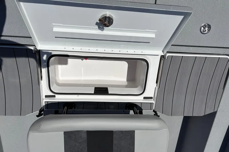 Slide: The Image of Open storage compartment on 2026 Vexus ACX 2150 boat, featuring sleek design and functionality. - 11