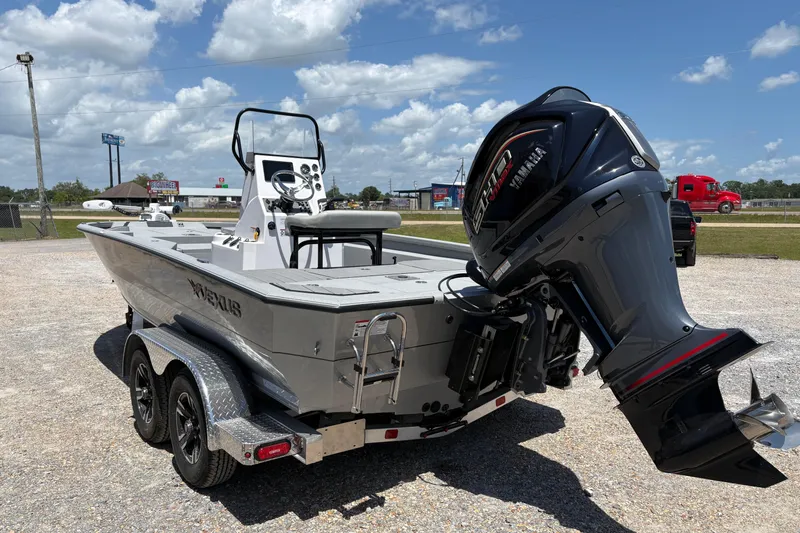 Slide: The Image of 2026 Vexus ACX 2150 boat with Yamaha outboard motor on a trailer. - 4