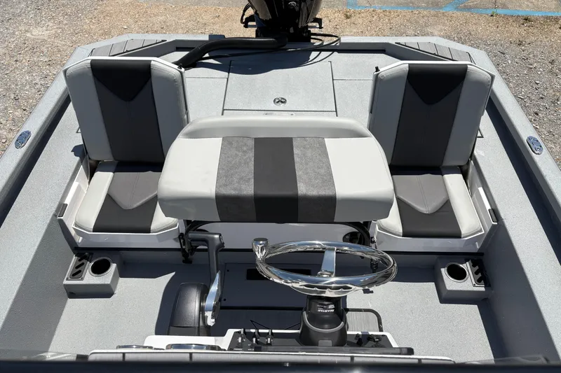 Slide: The Image of 2026 Vexus ACX 2150 boat interior with dual seats and steering wheel. - 8