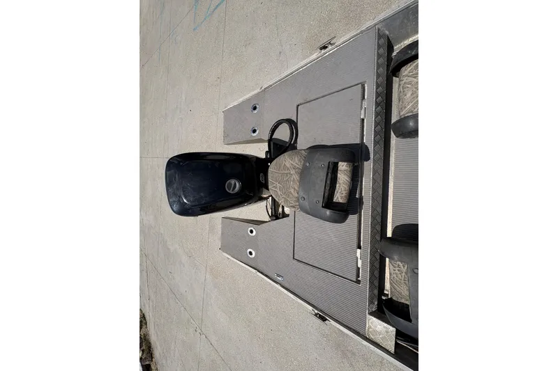 Slide: The Image of Custom 2010 Hanko 16' Side Console boat with camo seating and motor, viewed from above. - 12