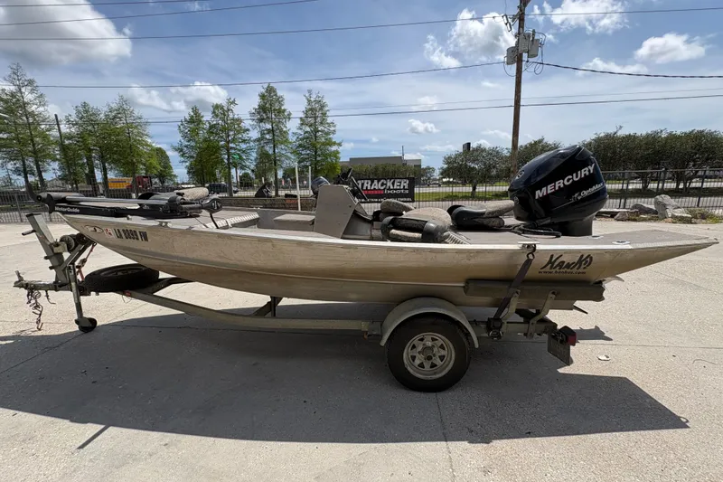 Slide: The Image of Custom 2010 Hanko 16' Side Console boat on trailer with Mercury outboard motor. - 7