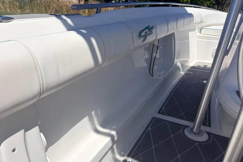 Slide: The Image of 2018 Glasstream 280 Pro-XS boat interior with cushioned seating and sleek design. - 16