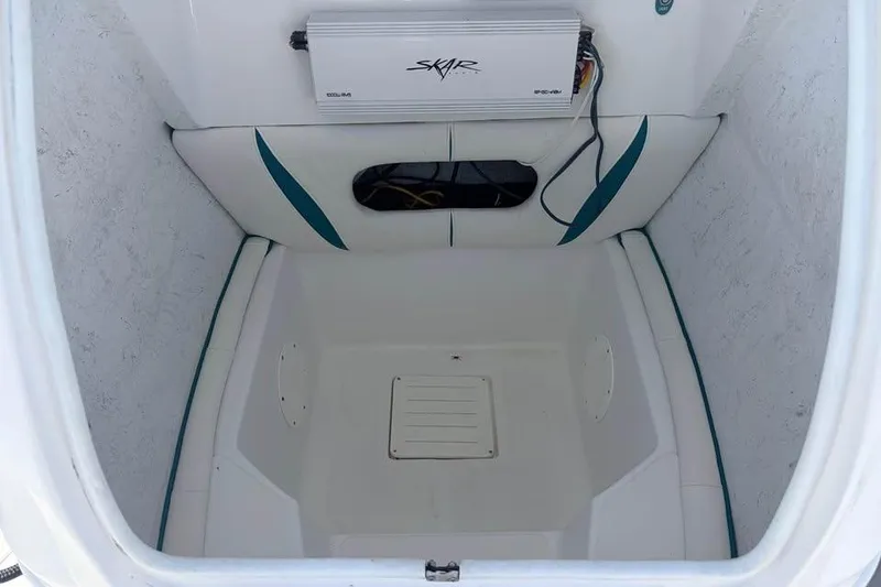 Slide: The Image of Interior view of a 2018 Glasstream 280 Pro-XS boat compartment with Skar audio equipment. - 4