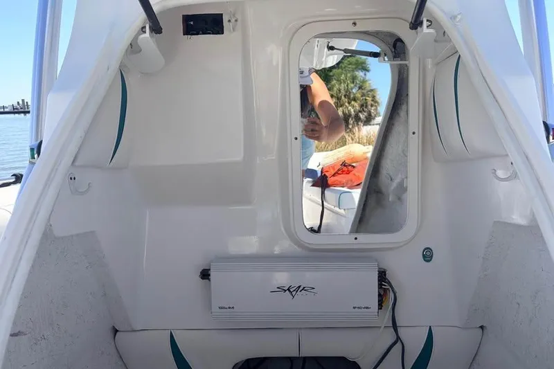 Slide: The Image of Interior view of a 2018 Glasstream 280 Pro-XS boat with Skar audio equipment. - 5