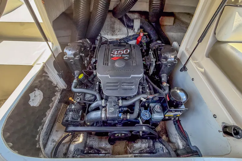 Slide: The Image of Engine compartment of a 2007 Sea Ray 220 Sundeck with a 350 MAG MPI engine. - 18