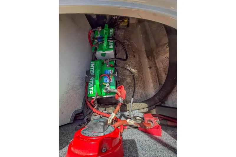 Slide: The Image of Battery compartment of a 2007 Sea Ray 220 Sundeck with Interstate batteries. - 19