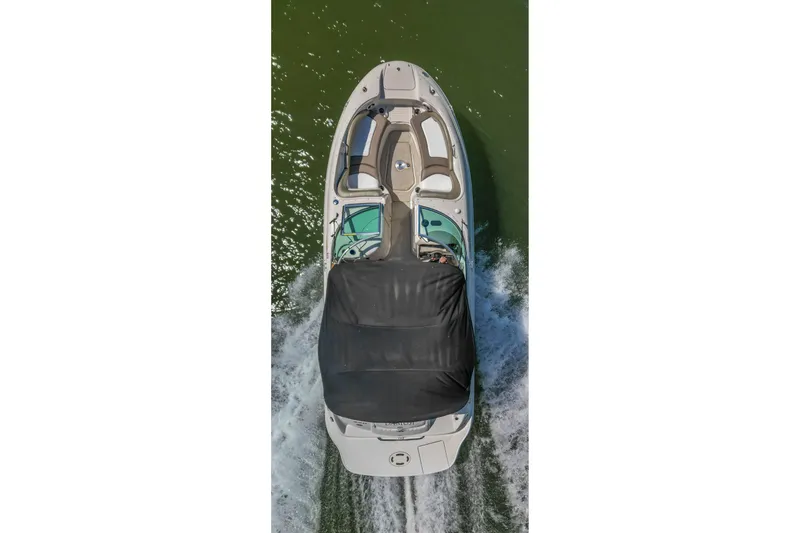 Slide: The Image of Overhead view of 2007 Sea Ray 220 Sundeck boat cruising on water. - 6
