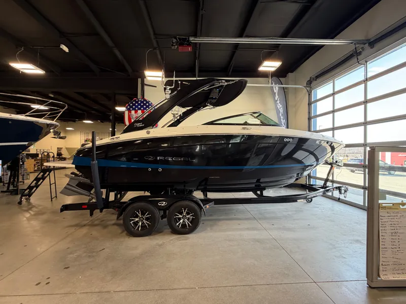 The Image of 2022 Regal LS4 Surf boat in showroom. - 0
