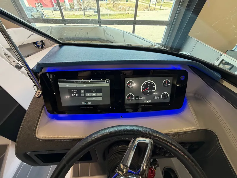 Slide: The Image of 2022 Regal LS4 Surf boat cockpit with modern instruments. - 10