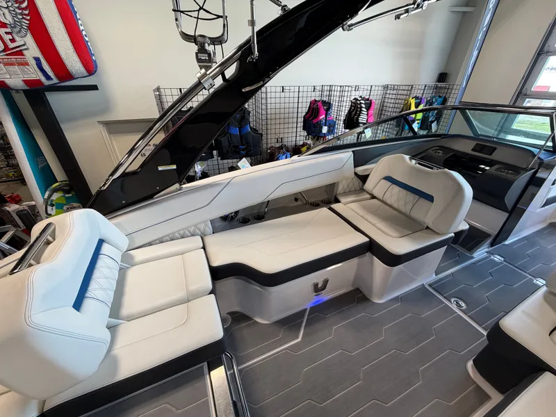 Slide: The Image of Interior of 2022 Regal LS4 Surf boat with luxurious seating. - 11